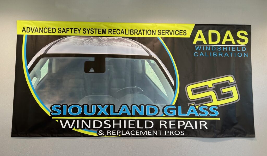an ad banner for Siouxland Glass